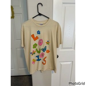 Mega Yacht Graphic Tee shirt with the words “Louis Vuitton”